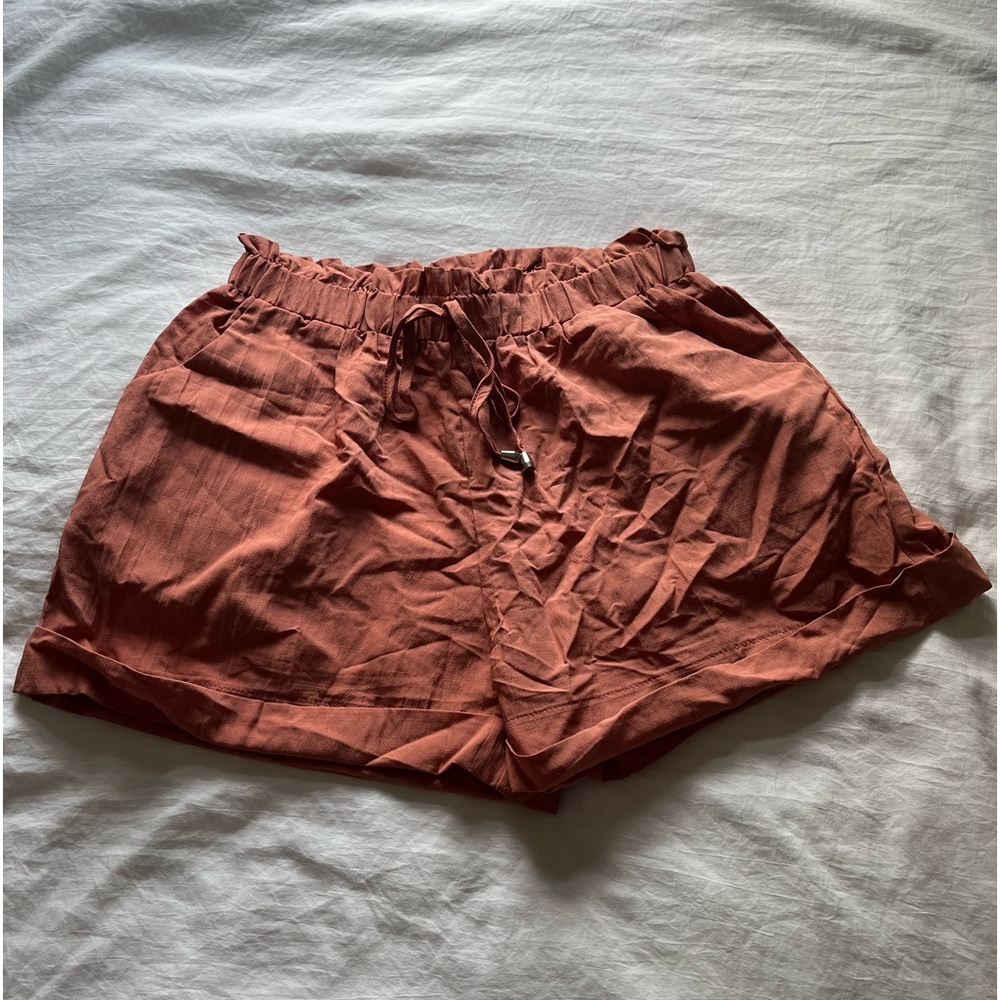 SHEIN Frenchy Rolled Hem Paperbag Waist Shorts in Dusty Pink